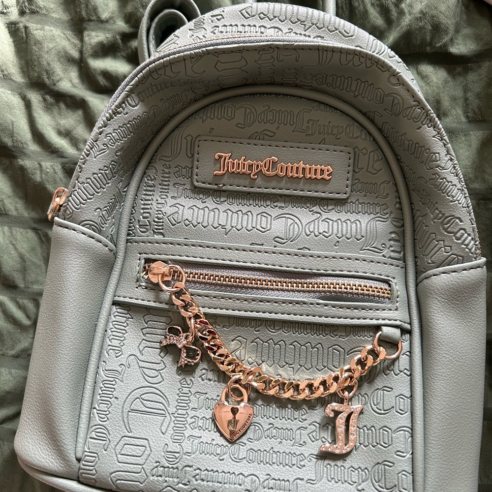 Juicy Couture Embossed Greenish Backpack with Gold Accents